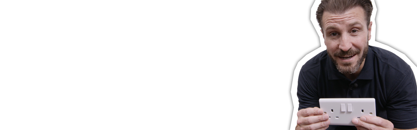 Electrician holding a double socket plug