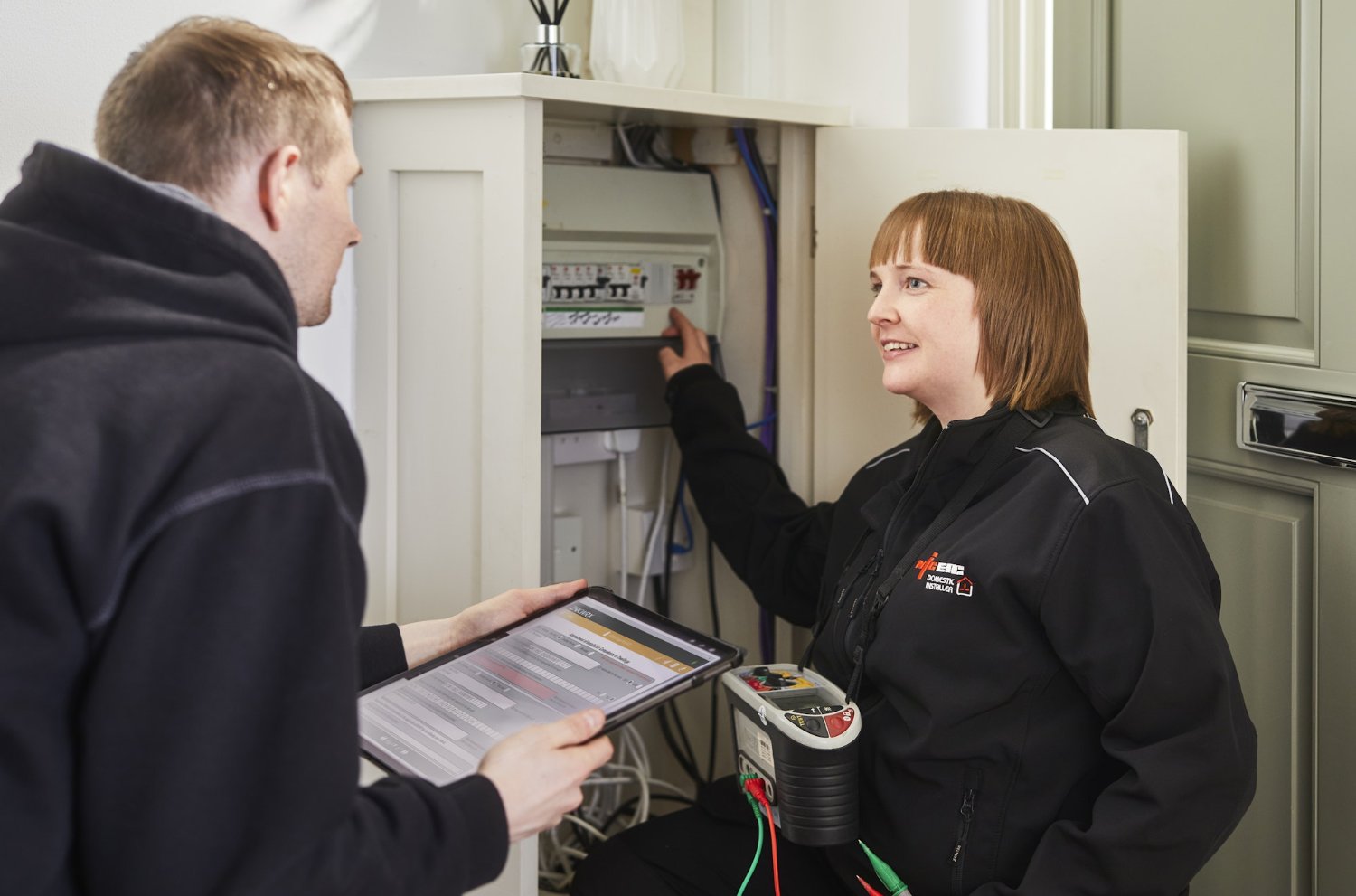 Electricians working on a job